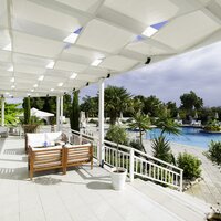 Hotel Happy Days - posedenie pri bazéne - letecký zájazd CK Turancar (Rodos, Theologos)